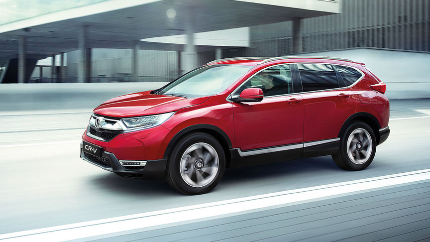 widok czerwonej Hondy CR-V z boku