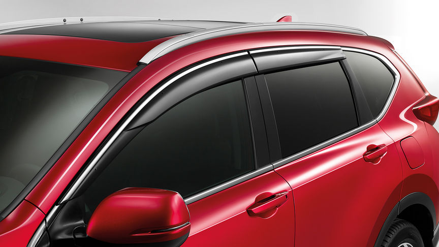 Honda CR-V — zbliżenie z boku przedstawiające owiewki szyb drzwi.