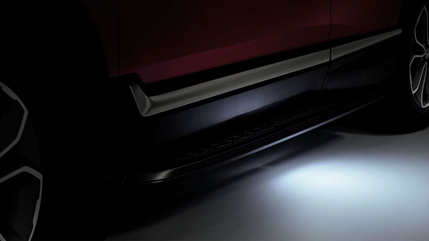 Honda CR-V Hybrid — zbliżenie przedstawiające oświetlenie wejścia.