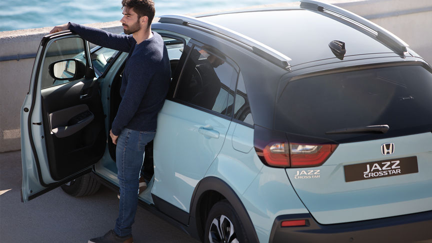 Honda Jazz rear three quarter view with open door 