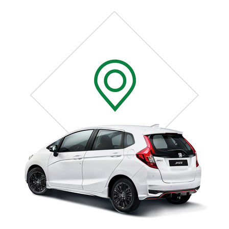 Honda Jazz z tyłu z ilustracją dealera.
