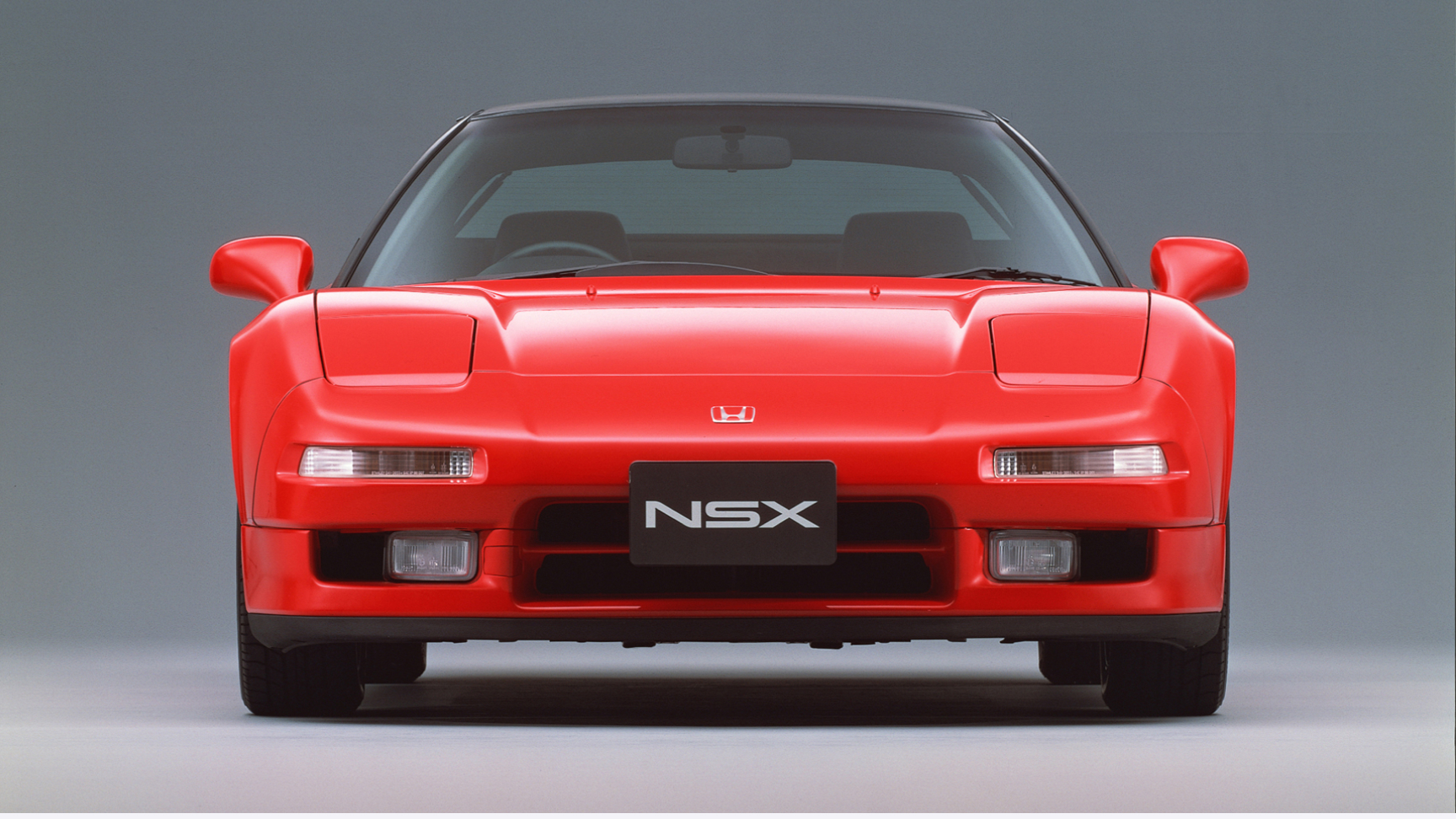 Honda NSX z przodu, zdjęcie studyjne.