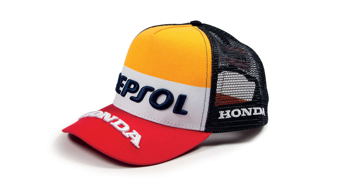 Czapka z daszkiem w pomarańczowych, białych i czerwonych barwach zespołu Honda MotoGP z logo Repsol.