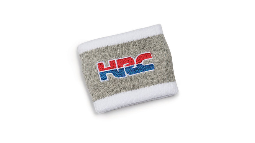 Szara opaska na nadgarstek Honda HRC w barwach klubowych HRC z logo Honda Racing Corporation.