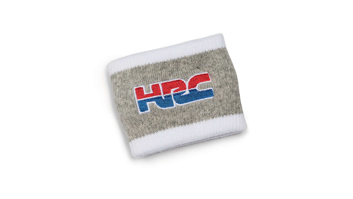 Szara opaska na rękę Honda HRC w barwach HRC z logo Honda Racing Corporation.